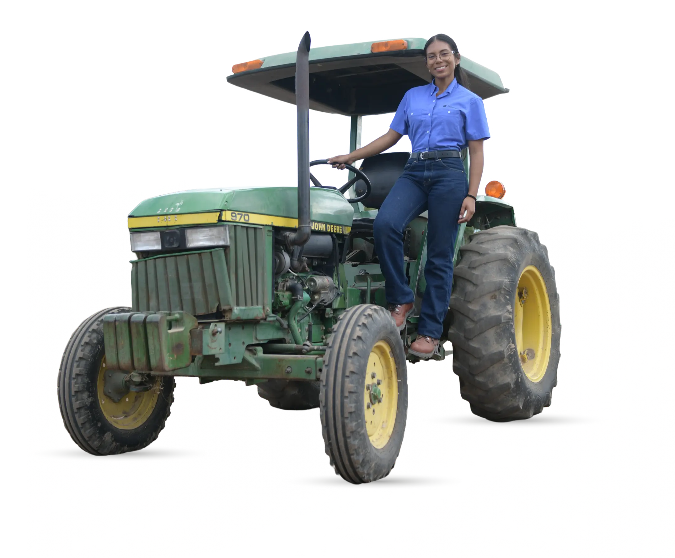 Zamorano student driving a tractor